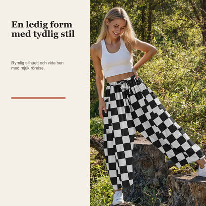 Rutiga vida byxor i rayon- och linneblandning