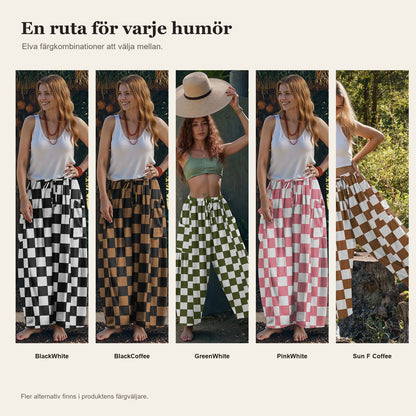 Rutiga vida byxor i rayon- och linneblandning