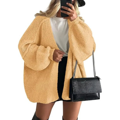Oversized stickad kofta med volymärmar