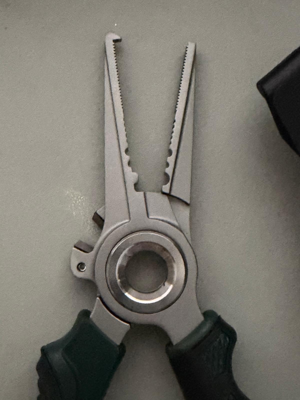 Original customer photo of the fishing pliers and included gear